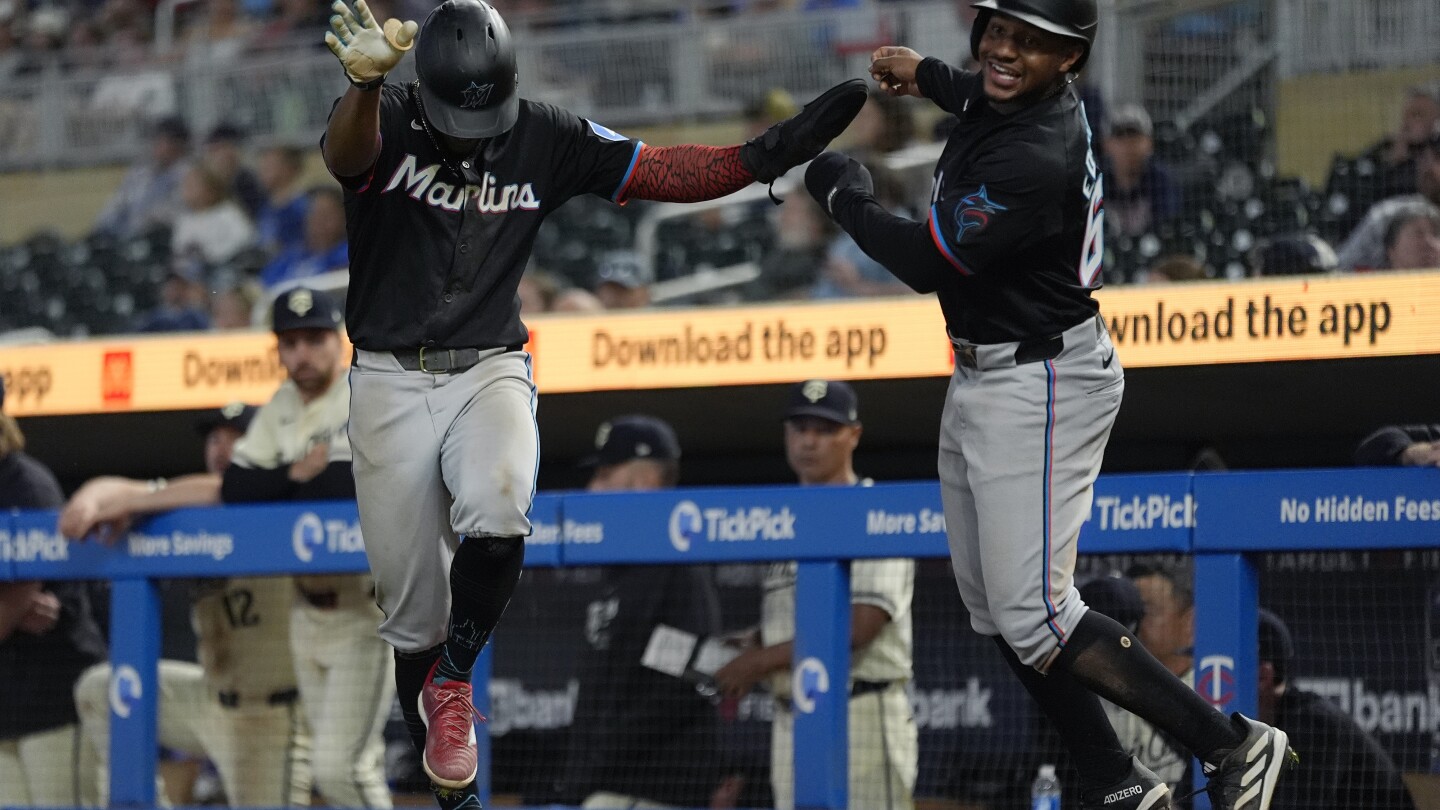 marlins-dejan-a-mellizos-al-borde-de-la-eliminacion,-al-vencerlos-8-6-en-13-innings